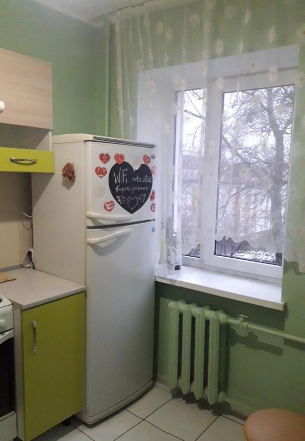 своя аккуратная: Cozy Retreat At Shevchenko Square Apartment Kyiv